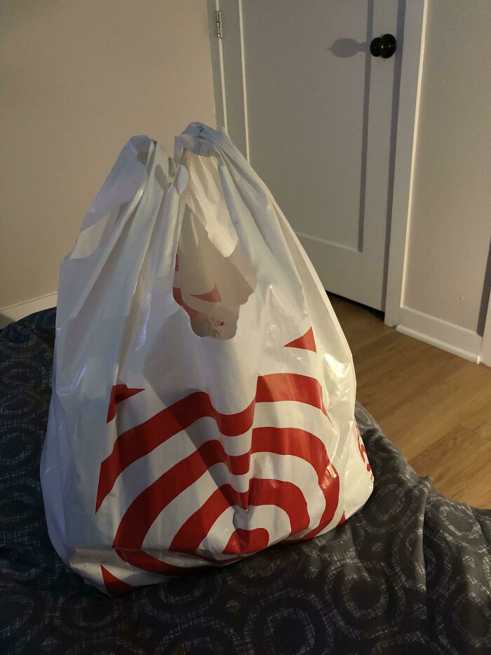 Plastic bag as airline baggage, highlighting an epic fail in luggage choices.