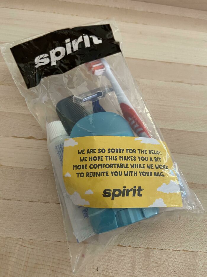 Spirit Airlines kit for baggage delay with toiletries and apology note.