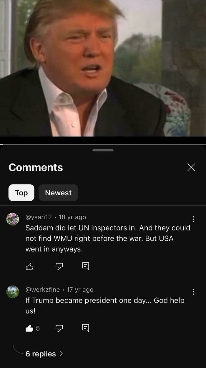 Man in a suit speaking during an interview with comments about predictions so accurate in the background.