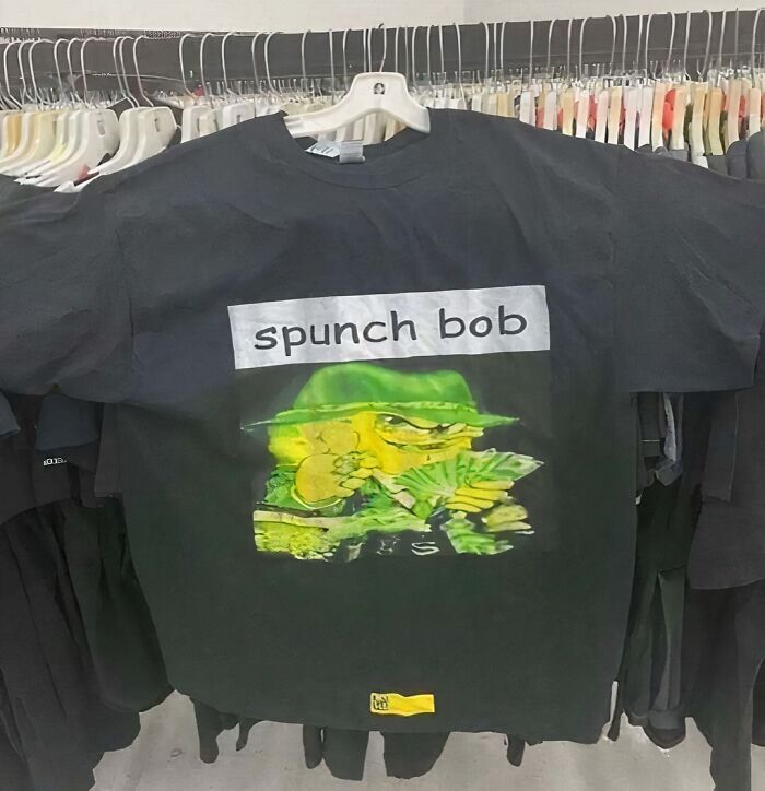 Chaotic t-shirt with a parody image labeled "spunch bob," featuring a cartoon character wearing a hat holding money.