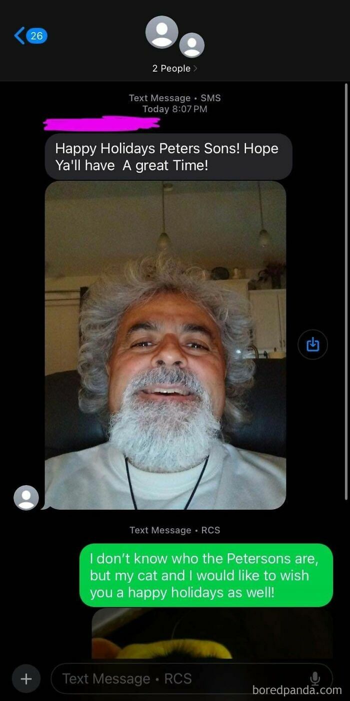 Confused wrong number text exchange wishing happy holidays, featuring a bearded man's selfie.