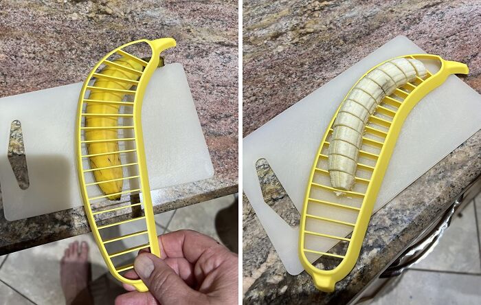 Yellow banana slicer cutting a banana on a white cutting board.