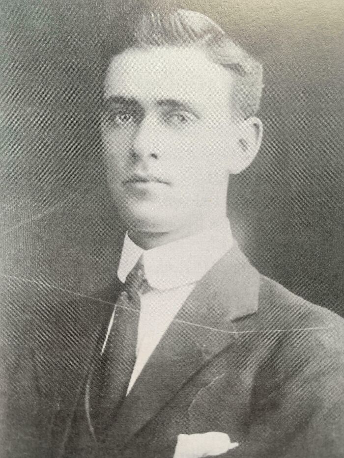 A rare photo of a man in a suit from 50-100 years ago, illustrating historical change.