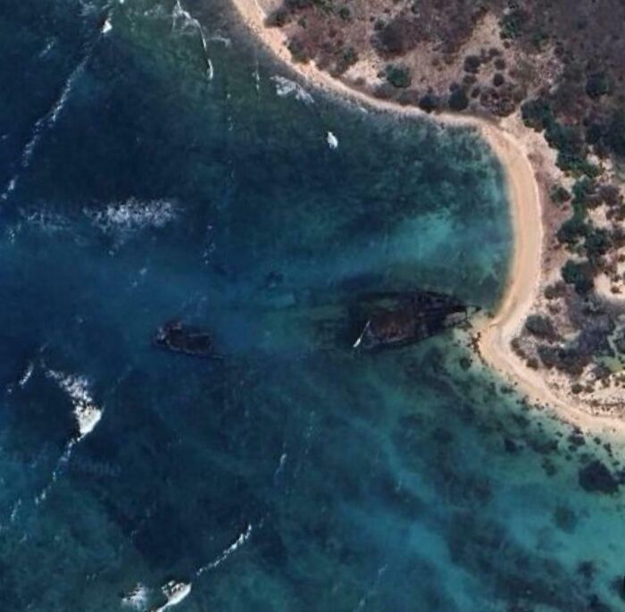 Google Earth view of a strange shipwreck near a coastline.