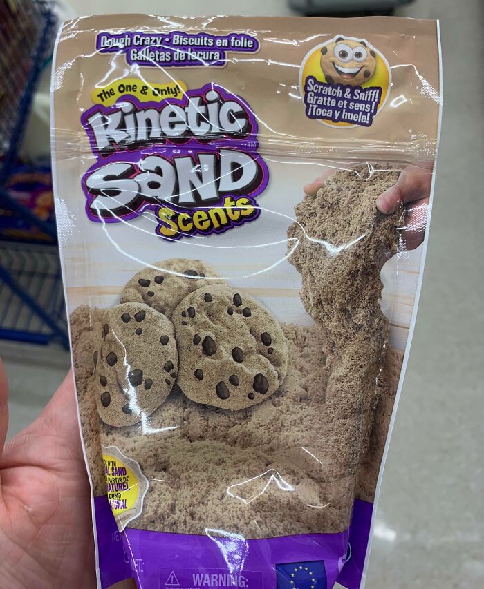 Kinetic sand with chocolate chip cookie design fail, packaged as a sensory toy with warning.