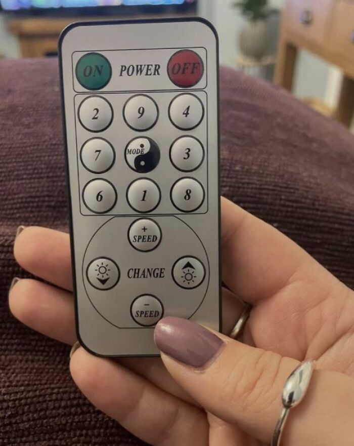 Remote control design fail with misplaced buttons labeled "ON" and "OFF" in a confusing layout.