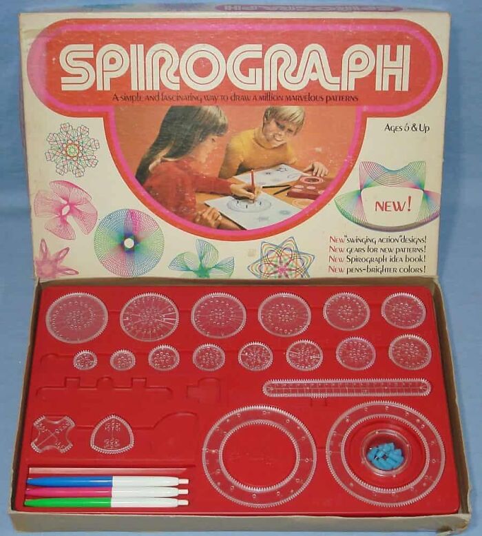 1980s Spirograph set with colorful pens and pattern disks in packaging, ideal for creating intricate geometric designs.