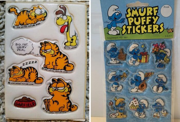 1980s stickers of Garfield and Odie, and Smurf characters like Papa Smurf and Smurfette in colorful puffy designs.
