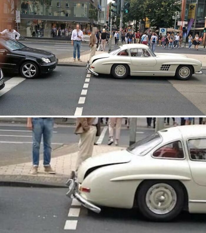 Vintage car accident in busy intersection, attracting attention after an expensive collision.