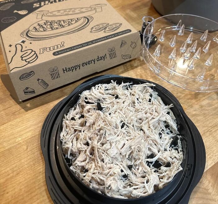 Shredded chicken in a kitchen tool with packaging, a practical kitchen game-changer.