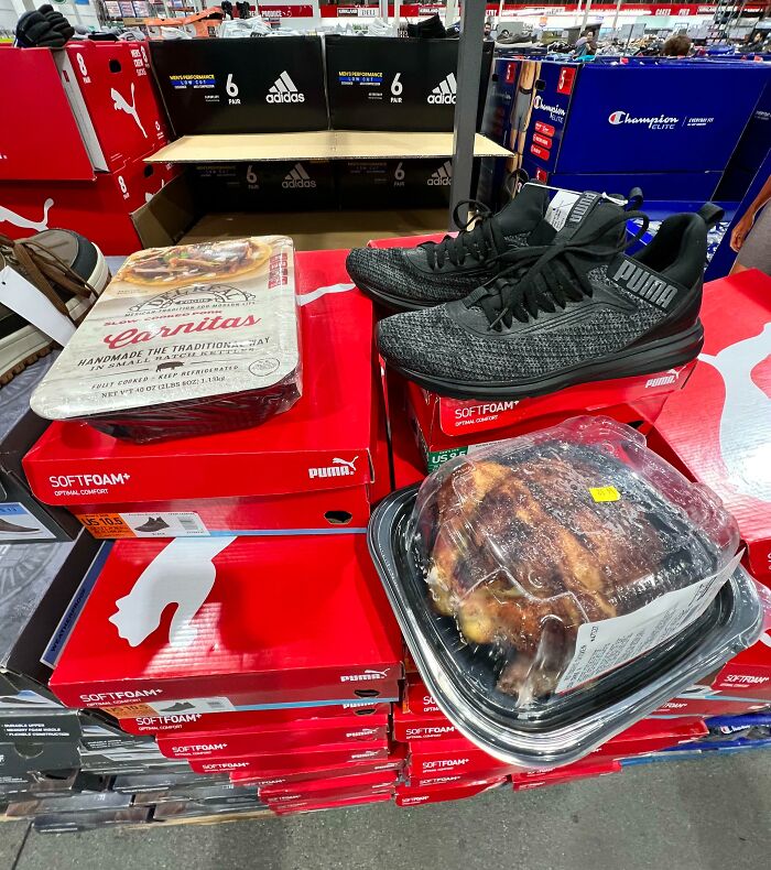 Sneakers displayed with carnitas and rotisserie chicken, showcasing customer cluelessness at a store.