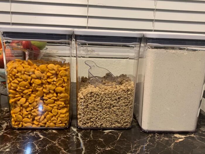 Pantry organization with three containers holding snacks and dry goods, enhancing quality of life.