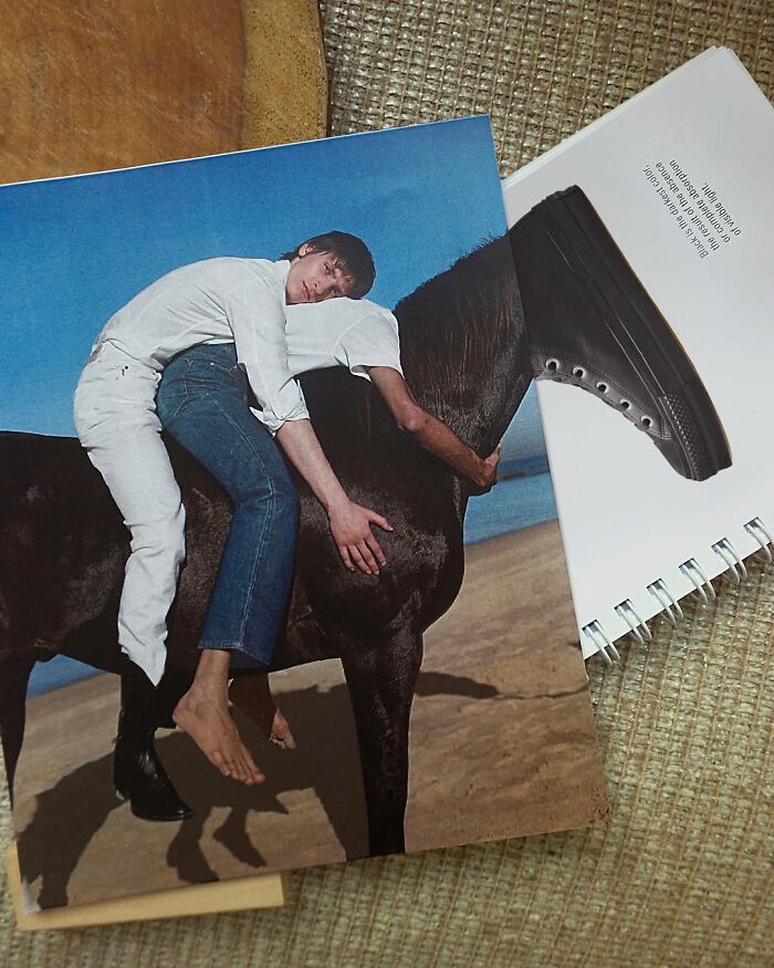 Man on horse photo blends with book, creating an illusion by Dudi Ben Simon, featuring clever artistic fusion.