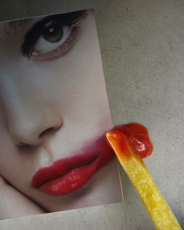 French fry with ketchup blends into a photo of red lips, showcasing the art of illusion and creative fusion.