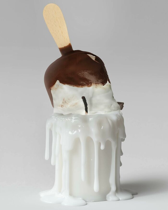 A melting candle resembling an ice cream bar, illustrating the art of illusion.