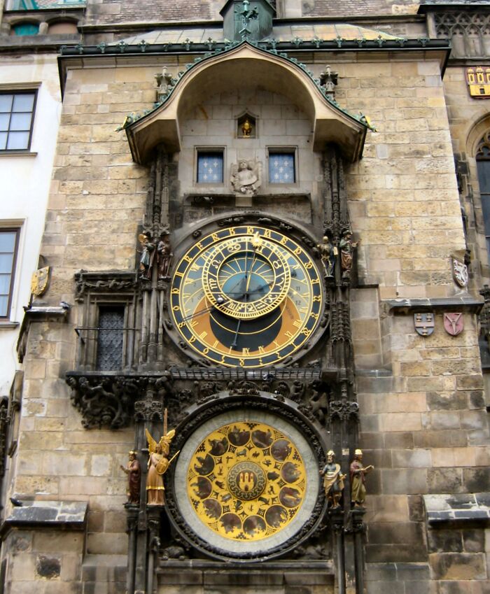 Astronomical Clock, Prague: iconic place with intricate golden dials and historical stone facade.