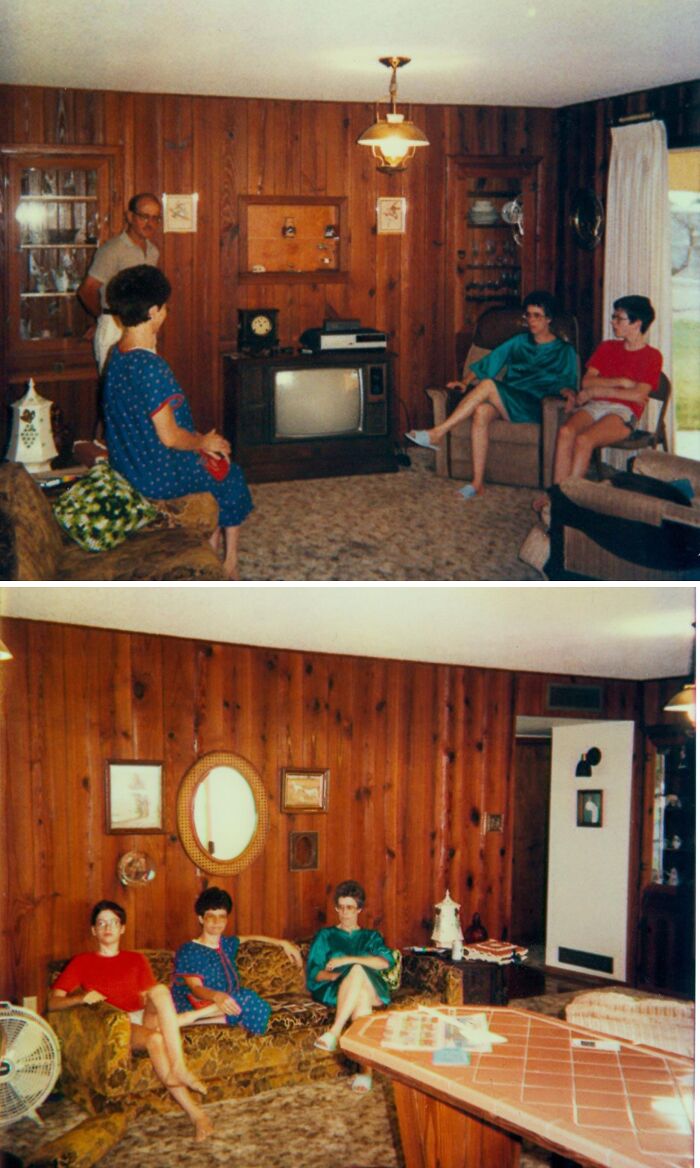 1980s living room with brown wood paneling, vintage TV, and three people seated on patterned sofas.