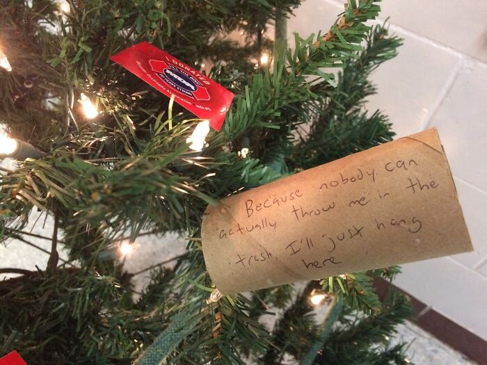Passive-aggressive note on a tree says, "Because nobody can actually throw me in the trash I'll just hang here."