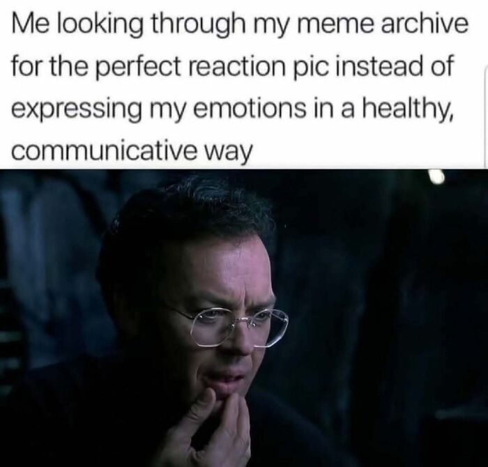 Man contemplating with glasses, meme text mocks avoiding healthy communication. Introverts' diary humor.
