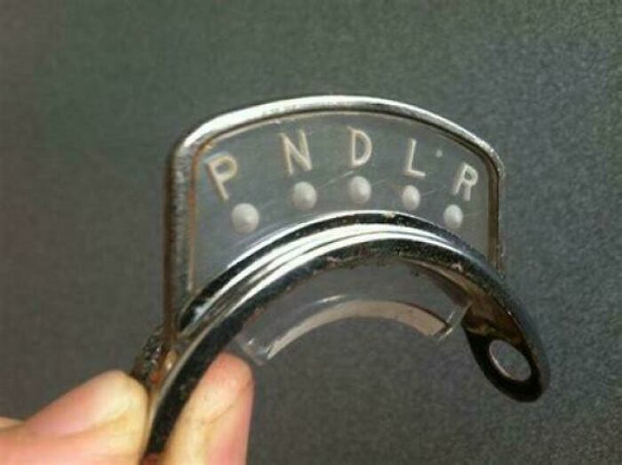 Close-up of a nostalgic car gear indicator showing P N D L R, evoking memories for people who realize they’re old now.