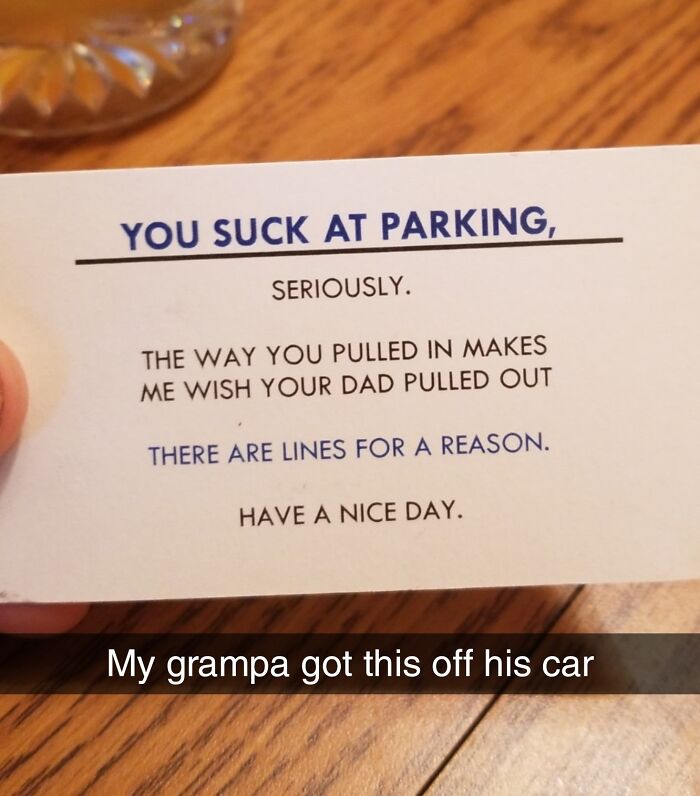 A passive-aggressive parking note left on a car, humorously criticizing the parking job.