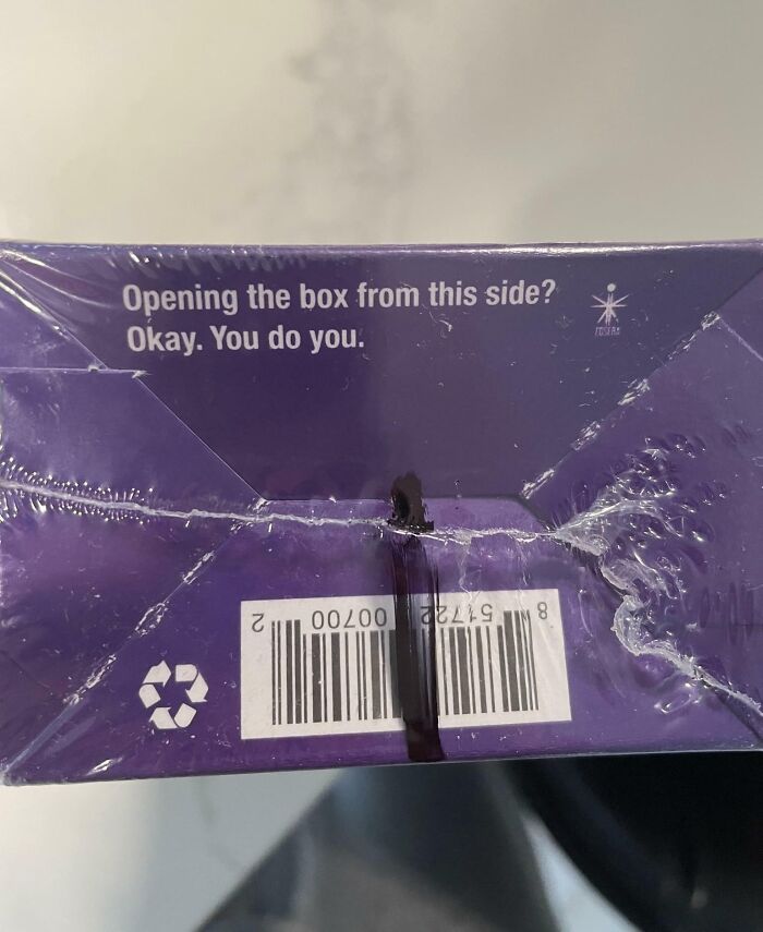 Box with passive-aggressive text: "Opening the box from this side? Okay. You do you."