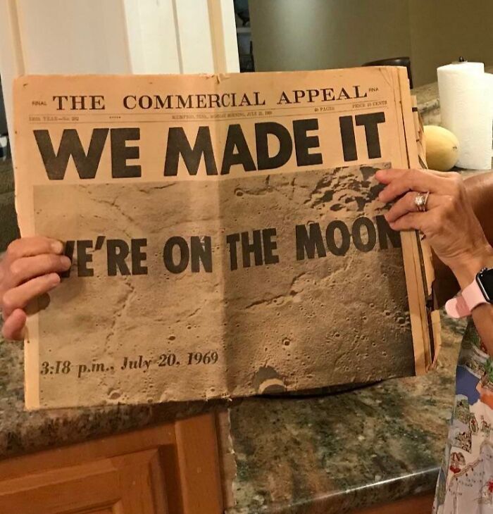 Old newspaper headline on moon landing from July 20, 1969, found in an old house.