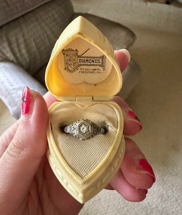 A vintage ring in a heart-shaped box, a fascinating artifact from the past found in an old house.