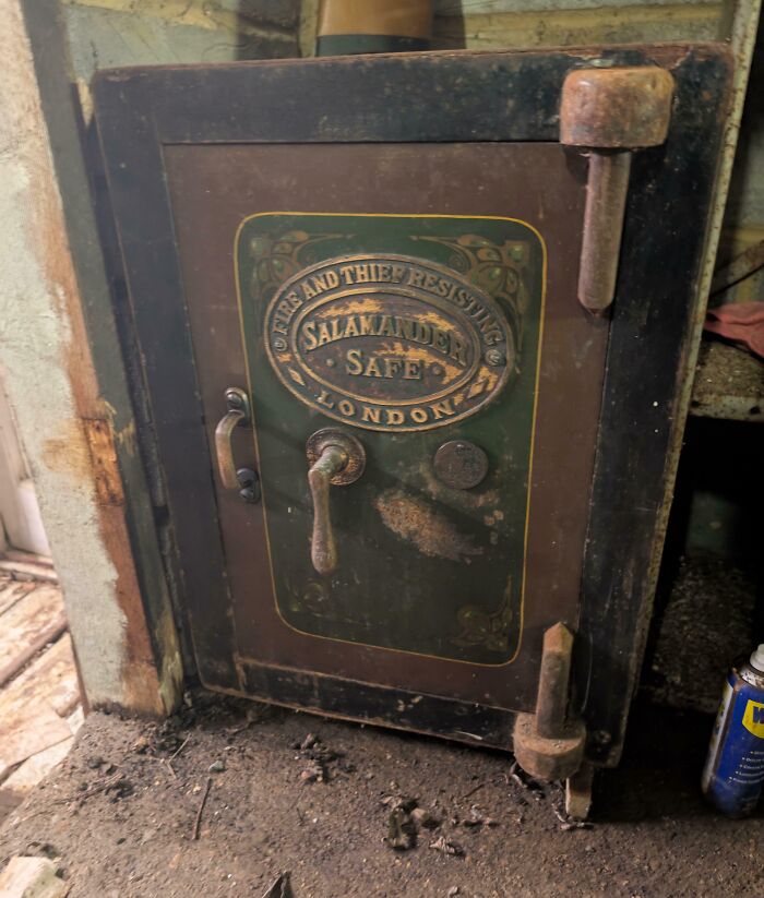 Old Salamander safe found in a house, showcasing historical metalwork and vintage design.