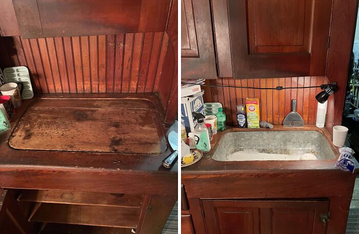 Old house artifact, a hidden wooden countertop revealing a sink beneath, surrounded by various kitchen items.