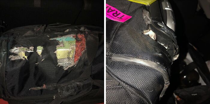 Destroyed airline baggage with torn fabric and exposed contents.