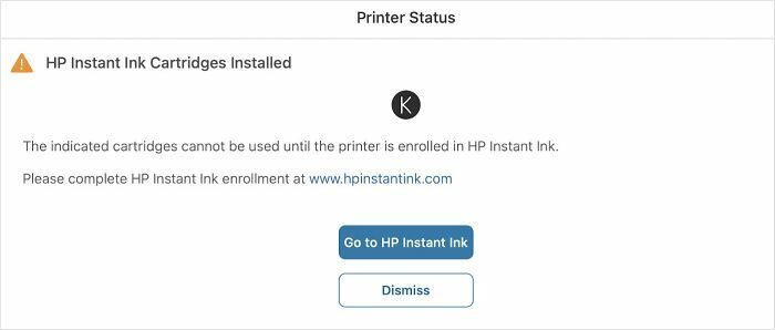 HP Instant Ink prompt warns of unusable cartridges without enrollment, highlighting potential scam concerns.