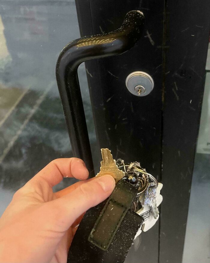 Broken key in lock at work, door handle shown, indicating a tough day.