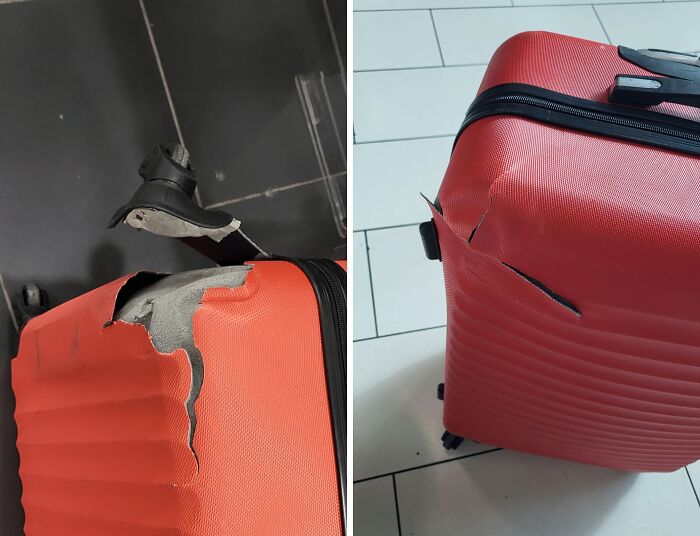 Damaged red suitcase with broken wheels and cracks, showcasing an epic airline baggage fail.