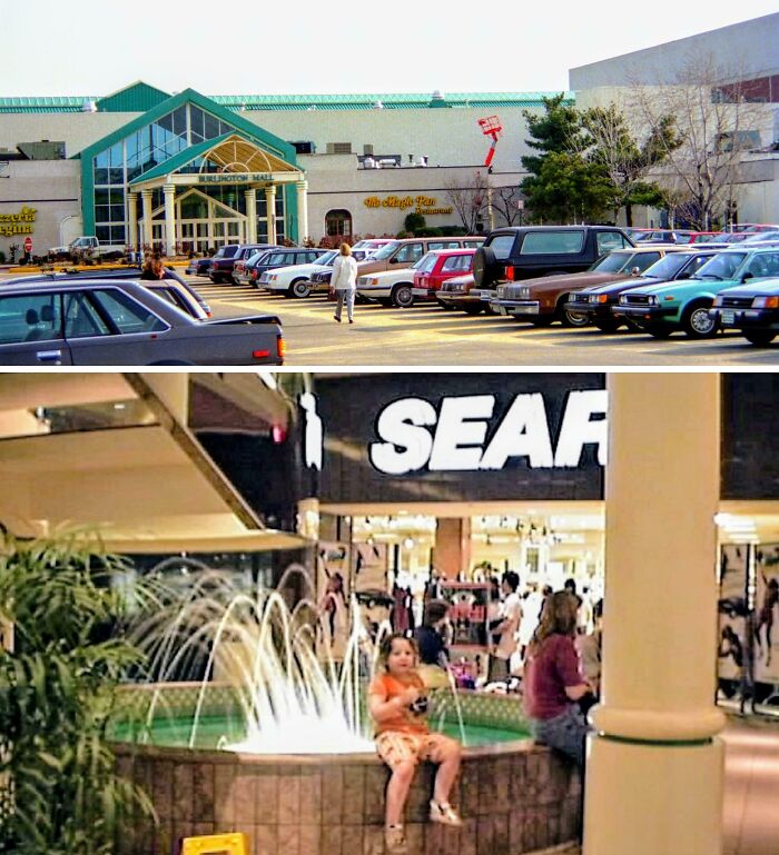 Vintage mall exterior with parked cars and a bustling Sears entrance with a fountain inside.