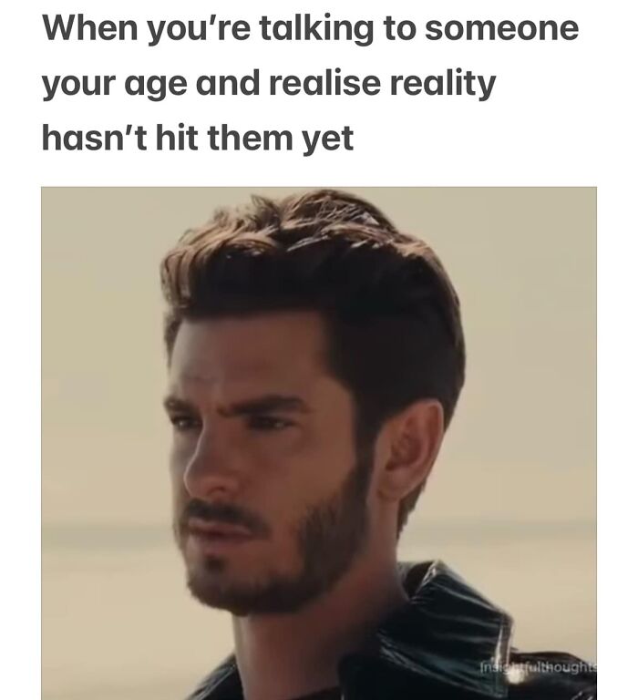 Man looking contemplative with caption about reality, representing sarcasm sodality.