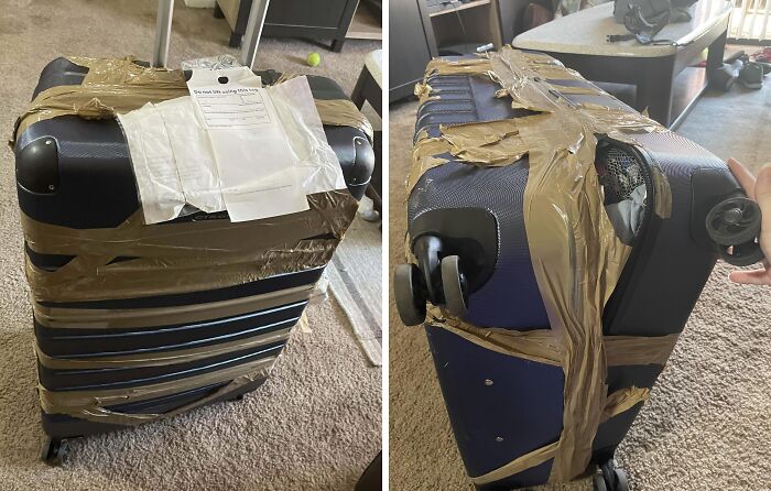 Damaged airline baggage wrapped in tape, showing c*****d and exposed suitcase parts on a carpeted floor.