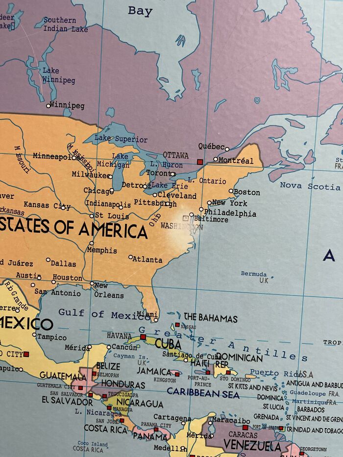 Map showing North America with faded colors, illustrating the wear of time on the belongings.