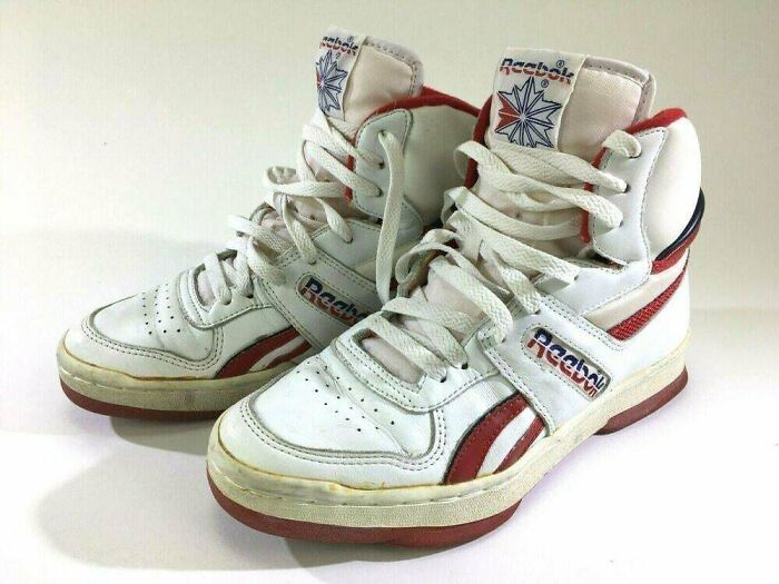 Vintage Reebok high-top sneakers in white and red, showcasing their collectible value.