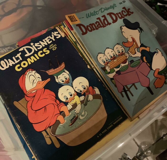 Vintage Disney comics featuring Donald Duck and Huey, Dewey, and Louie, showcasing collectible items.