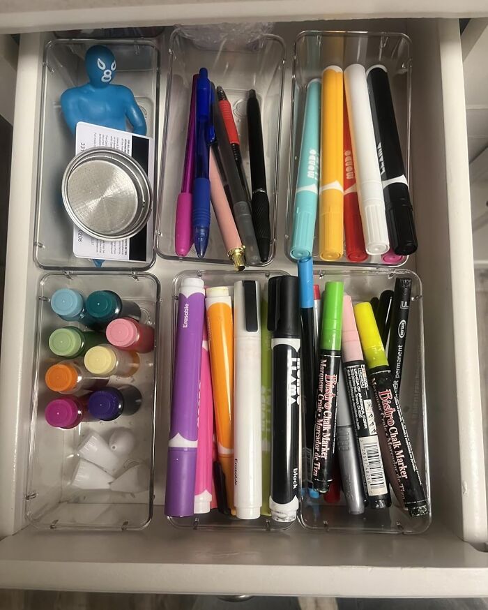Drawer with organized markers and pens showcasing spring discounts on Amazon bargains.