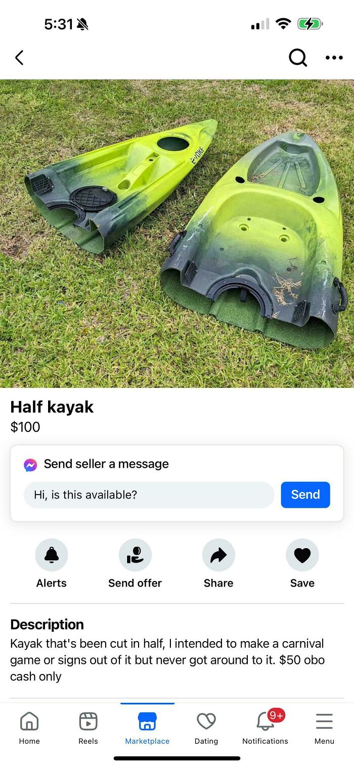 Half kayak for sale on Facebook Marketplace, cut in half and placed on grass.