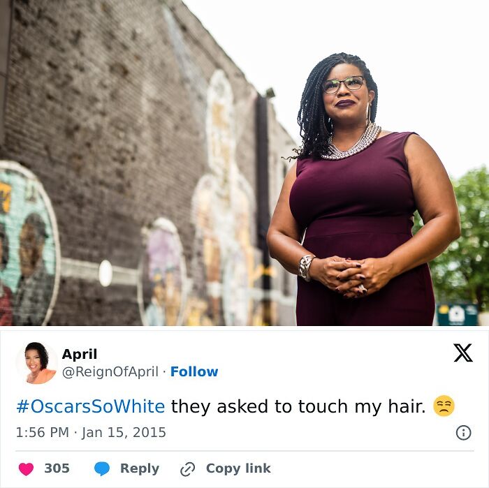 Woman in purple dress stands by mural, with tweet referencing Oscars and a scandalous comment about touching hair.