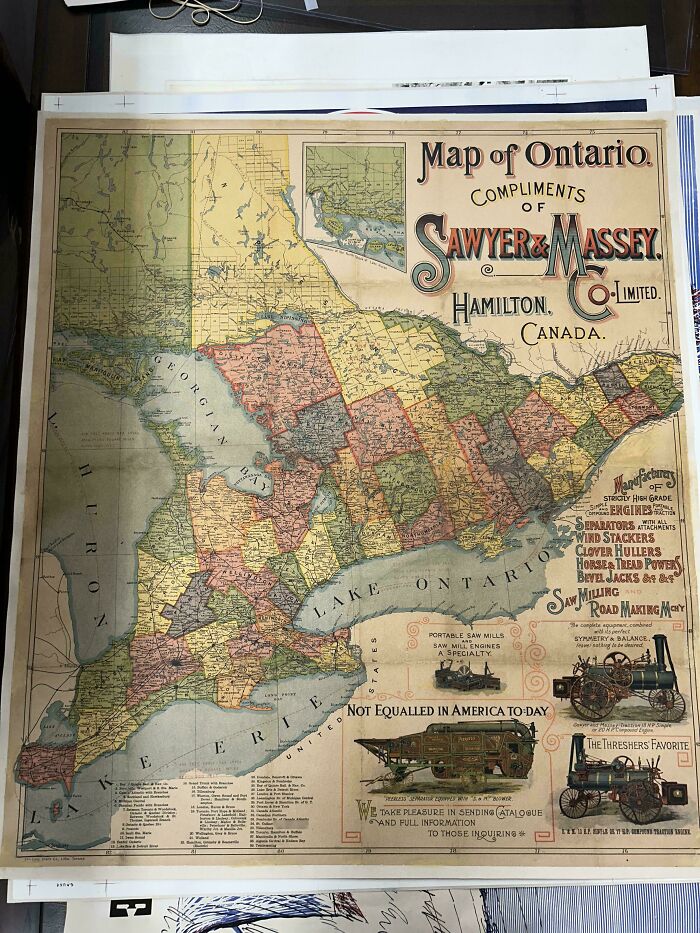 Vintage Ontario map by Sawyer & Massey, showcasing detailed regions and antique illustrations.