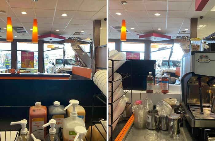 Car crashes into cafe window, causing workplace chaos with scattered bottles and supplies. Worst day at work scene.