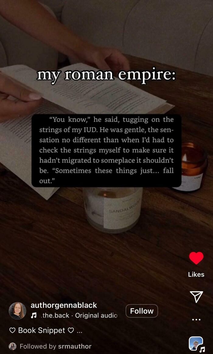 Open book with highlighted quote about IUD strings, labeled "my roman empire," and a sandalwood candle nearby.