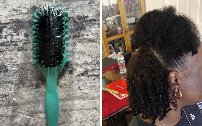 Green hairbrush with black bristles next to a person showcasing defined curls with a half updo hairstyle.