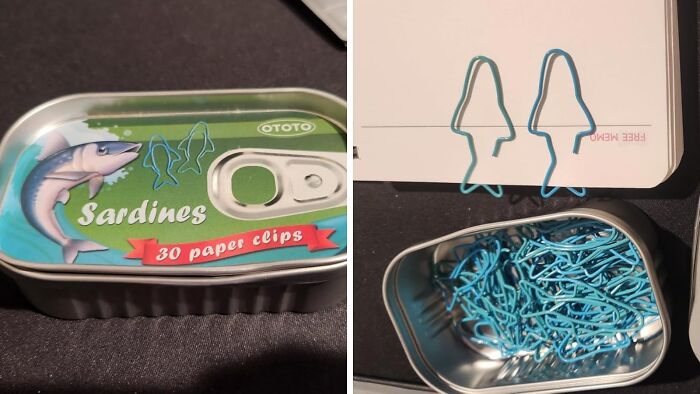 Sardine can filled with 30 fish-shaped paper clips, creatively illustrating "Office Olympics" in a workspace setting.