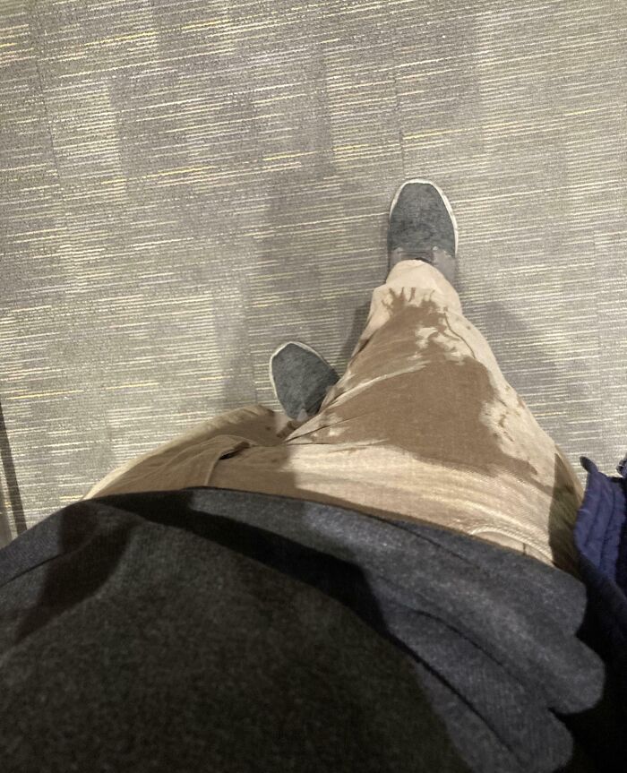 Wet stain on someone's pants, possibly indicating a rough day.