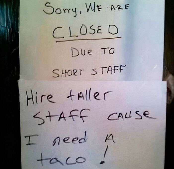 Closed sign with humor about short staff, suggesting taller hires for tacos, from a meme page.